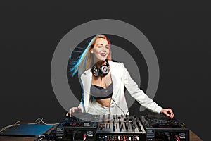 Beautiful blonde DJ girl on decks - the party