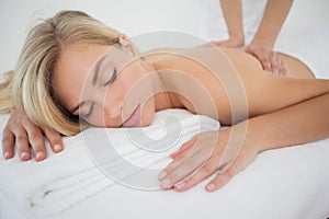 Beautiful blonde enjoying a massage