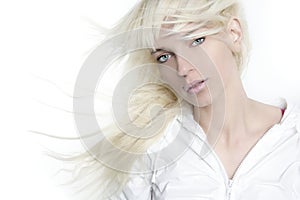 Beautiful blonde girl fashion wind long hair