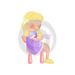 Beautiful blonde girl sitting on toy chair and holding tea cup, girl playing at tea party cartoon vector Illustration