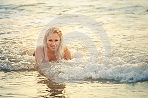 Beautiful blonde girl in swimming suit