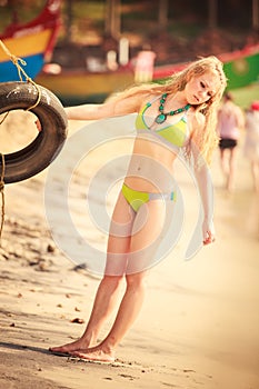 Beautiful blonde girl in swimming suit