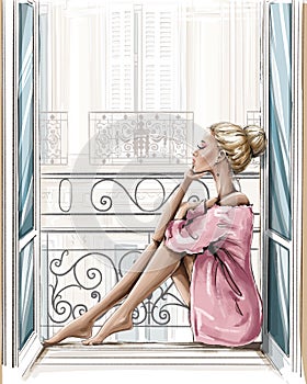 Beautiful blonde hair woman sitting on windowsill.