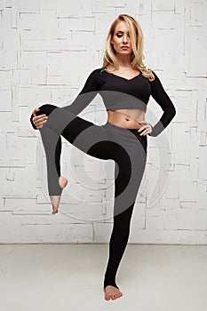 Beautiful blonde perfect athletic slim figure pilates yoga