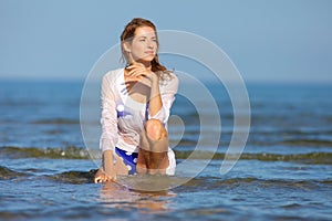 The beautiful blonde in the sea