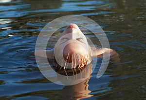 Beautiful blonde in sea