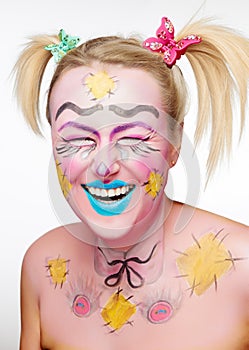 Beautiful Blonde smiling girl with funny body art