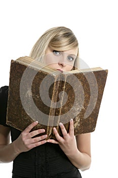Beautiful blonde student girl with old book