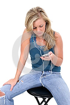 Beautiful Blonde Teen Girl Listening to Ipod