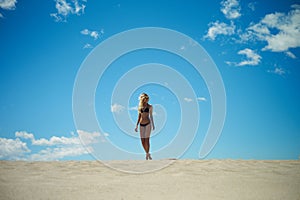 Beautiful blonde woman on the beach