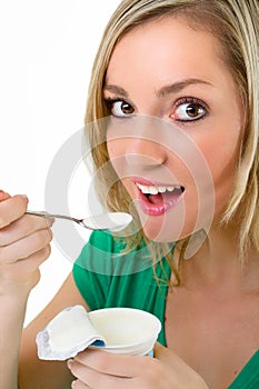 Beautiful blonde woman eating