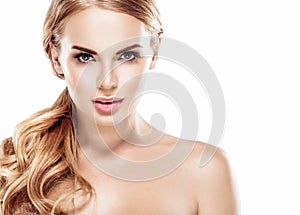 Beautiful blonde woman face close up portrait studio on white