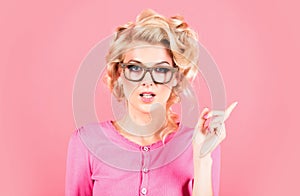 Beautiful blonde woman model wear glasses. Retro pinup style.