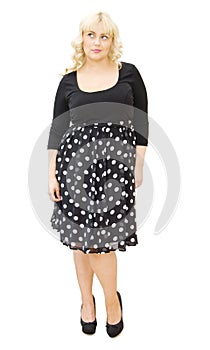 Beautiful blonde woman in polka dots dress photo