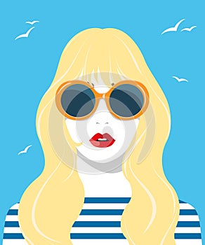 Beautiful blonde woman wearing fashionable sunglasses