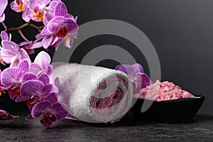 Beautiful blooming orchid flowers and pink sea salt