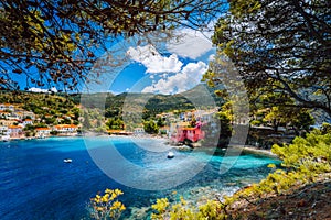 Beautiful blue bay in Assos village located on Kefalonia. Summer tourism vacation trip around Greece photo