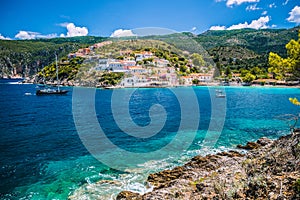 Beautiful blue bay in Assos village located on Kefalonia. Summer tourism vacation trip around Greece