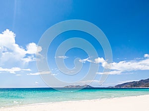 Beautiful blue beach panoramic sea view, with clean Azure water, blue sky, white clouds. Idyllic cloudscape