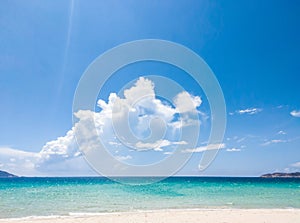 Beautiful blue beach panoramic sea view, with clean Azure water, blue sky, white clouds. Idyllic cloudscape