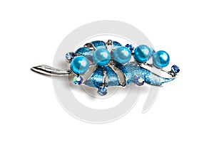 Beautiful blue brooch isolated on white