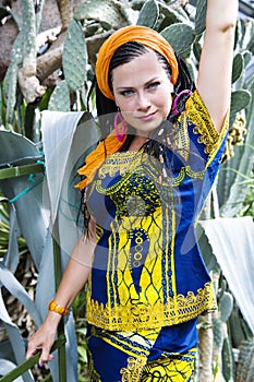 Beautiful blue-eyed woman with the african pigtails