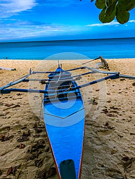 Beautiful Blue Fishing Boat at the Beach