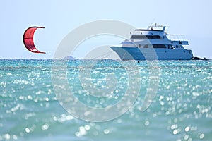 Beautiful blue lagoon. Sea view, water with waves around the boat ship yacht. Red Sea, Egypt, Hurghada. Sea view with white yacht