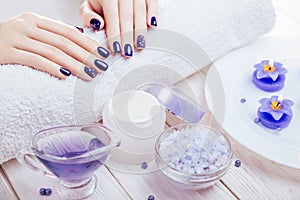 Beautiful blue manicure with spa essentials