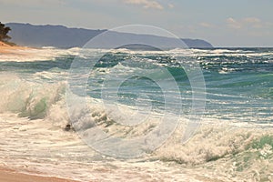 Beautiful blue ocean and sandy beach on the island of Oahu in Hawaii