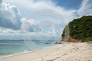 Beautiful Blue ocean with white sand beach.