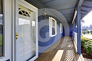 Beautiful blue porch looking out into front yard.