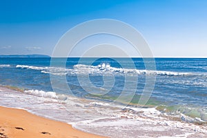 Beautiful blue sea with a wave on a summer day. Natural background of nature, seascape