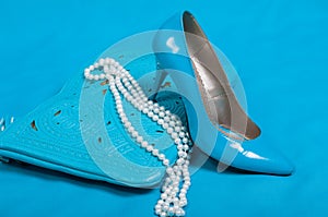 Beautiful blue shoes and handbag, pearls