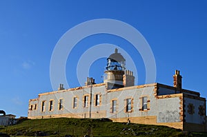 Beautiful Blue Skies Behind Neist Point Lighthouse in Scotland