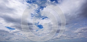 Beautiful blue sky background with tiny clouds. Natural cirrus cloud background