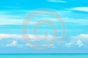 Beautiful blue sky blue sea water and white clouds on sunny day. Cloudscape. Transport ship in the sea. Soft color of pastel blue