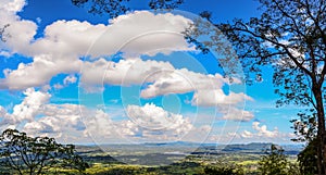 Beautiful blue sky filled with  white clouds at Phukradueng National park, Thailand.