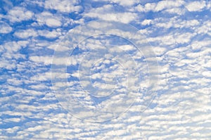 Beautiful blue sky with full srange white cloud and clear light under shining from the sun in the morning