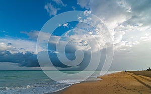 Beautiful blue sky holiday beach scene - getaway on a vacation beach in Cuba.