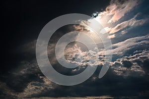 Blue sky with sun and clouds