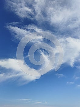 Beautiful blue sky at sunny day with thin white clouds?