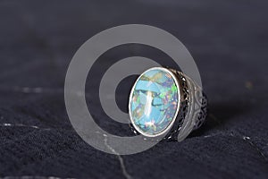 A beautiful blue turquoise is a silver ring decorated with turquoise placed