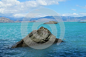 Beautiful blue water lake in Rio Tranquilo, Chile photo