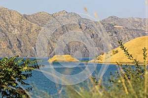 Beautiful blue waters of Nurek reservoir