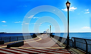 Beautiful boardwalk into ocean, Staten Island New York  photo