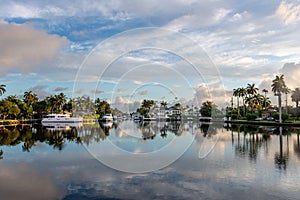 Beautiful boats and luxury homes for the rich and famous line the canals near Las Olas Blvd.  in Fort Lauderdale Florida photo