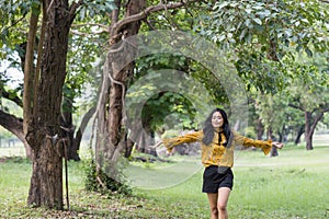 Girl relax in garden. Refresh with greenery