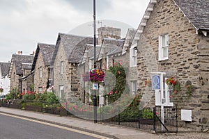 Beautiful boulder houses in the main street of Pitlochry, Scotland photo