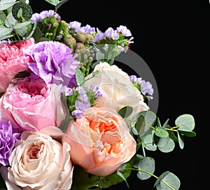 Beautiful bouquet of bright white pink purple roses flowers with